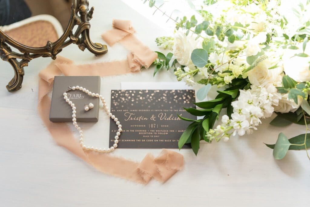 Planning a wedding on a 10K budget - invitation suite with pearls & bouquet