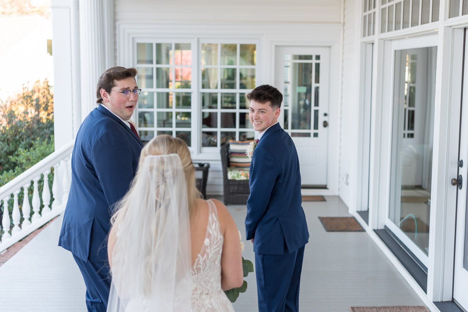 Atlanta Wedding Photographer FAQ - bride's first look with her brothers