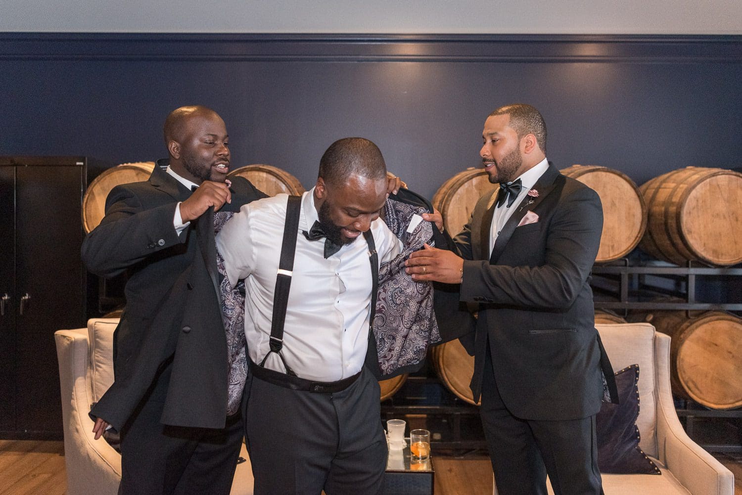 Atlanta Wedding Photographer FAQ - groom being dressed