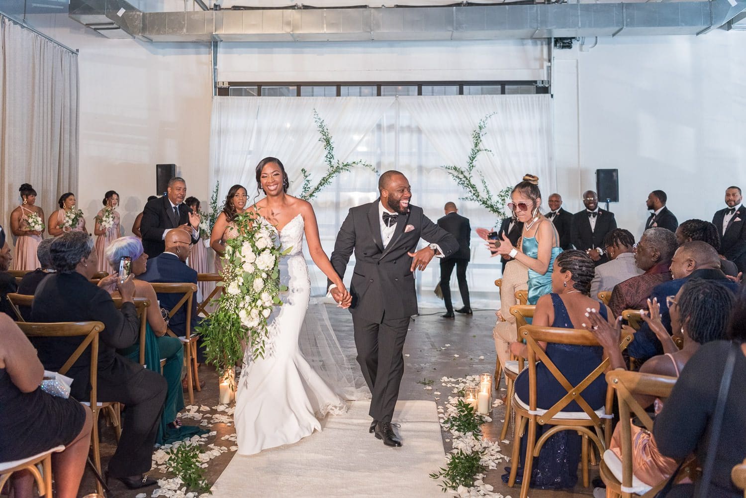 Atlanta Wedding Photographer FAQ - bride & groom processing out of ceremony